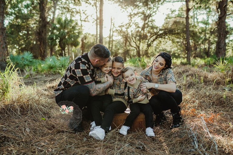 posing for family photos in boca raton