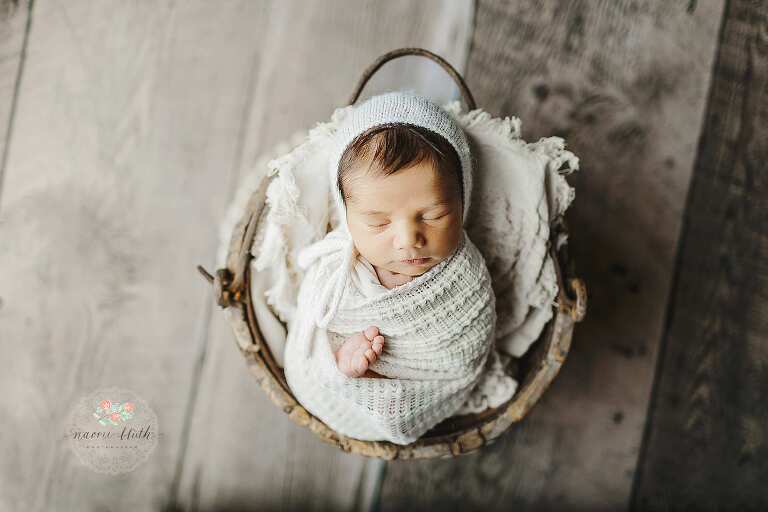 baby boy in basket in boca raton photo studio