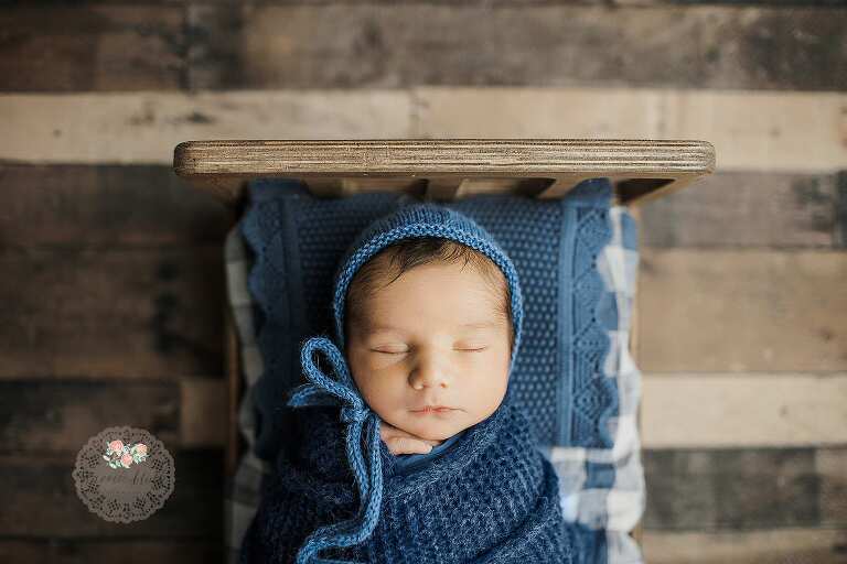 Baby boy in the best newborn photographers studio in Boca Raton.